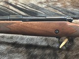 FREE SAFARI, NEW WINCHESTER MODEL 70 SUPER GRADE 7mm REM MAG 26