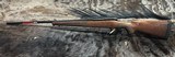 FREE SAFARI, NEW WINCHESTER MODEL 70 FEATHERWEIGHT 300 WIN MAG RIFLE 22