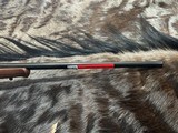FREE SAFARI, NEW WINCHESTER MODEL 70 FEATHERWEIGHT 300 WIN MAG RIFLE 22