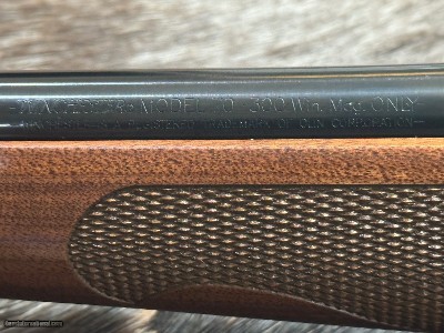 FREE SAFARI, NEW WINCHESTER MODEL 70 FEATHERWEIGHT 300 WIN MAG RIFLE 24