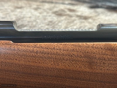 FREE SAFARI, NEW WINCHESTER MODEL 70 FEATHERWEIGHT 300 WIN MAG RIFLE 24