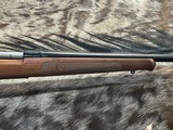 FREE SAFARI, NEW WINCHESTER MODEL 70 FEATHERWEIGHT 300 WIN MAG RIFLE 22