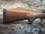 FREE SAFARI, NEW WINCHESTER MODEL 70 FEATHERWEIGHT 300 WIN MAG RIFLE 22