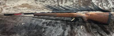 FREE SAFARI, NEW WINCHESTER MODEL 70 FEATHERWEIGHT 300 WIN MAG RIFLE 24
