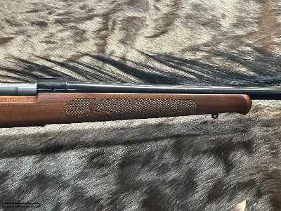FREE SAFARI, NEW WINCHESTER MODEL 70 FEATHERWEIGHT 300 WIN MAG RIFLE 24