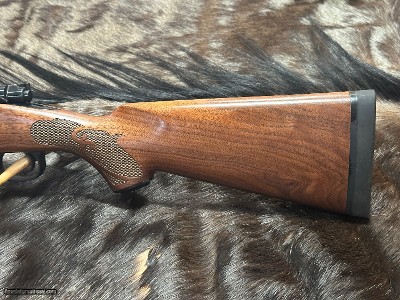 FREE SAFARI, NEW WINCHESTER MODEL 70 FEATHERWEIGHT 300 WIN MAG RIFLE 24
