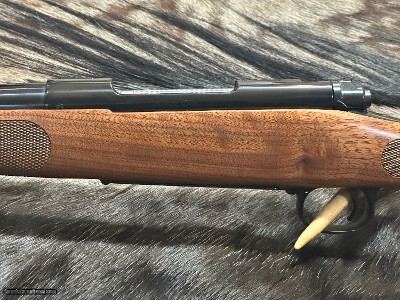 FREE SAFARI, NEW WINCHESTER MODEL 70 FEATHERWEIGHT 300 WIN MAG RIFLE 24