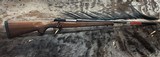 FREE SAFARI, NEW WINCHESTER MODEL 70 FEATHERWEIGHT 300 WIN MAG RIFLE 22