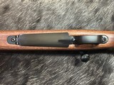 FREE SAFARI, NEW WINCHESTER MODEL 70 FEATHERWEIGHT 300 WIN MAG RIFLE 22