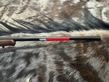 FREE SAFARI, NEW WINCHESTER MODEL 70 FEATHERWEIGHT 300 WIN MAG RIFLE 22