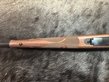 FREE SAFARI, NEW WINCHESTER MODEL 70 FEATHERWEIGHT 300 WIN MAG RIFLE 22
