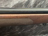 FREE SAFARI, NEW WINCHESTER MODEL 70 FEATHERWEIGHT 300 WIN MAG RIFLE 22