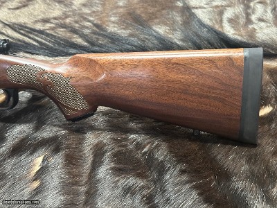 FREE SAFARI, NEW WINCHESTER MODEL 70 FEATHERWEIGHT 300 WIN MAG RIFLE 24