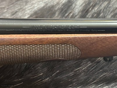 FREE SAFARI, NEW WINCHESTER MODEL 70 FEATHERWEIGHT 300 WIN MAG RIFLE 24