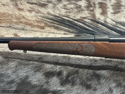 FREE SAFARI, NEW WINCHESTER MODEL 70 FEATHERWEIGHT 300 WIN MAG RIFLE 24