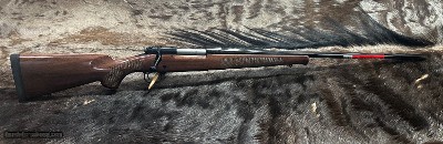 FREE SAFARI, NEW WINCHESTER MODEL 70 FEATHERWEIGHT 300 WIN MAG RIFLE 24