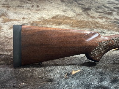 FREE SAFARI, NEW WINCHESTER MODEL 70 FEATHERWEIGHT 300 WIN MAG RIFLE 22