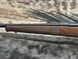 FREE SAFARI, NEW WINCHESTER MODEL 70 FEATHERWEIGHT 300 WIN MAG RIFLE 22