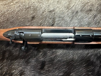 FREE SAFARI, NEW WINCHESTER MODEL 70 FEATHERWEIGHT 300 WIN MAG RIFLE 24