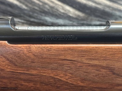FREE SAFARI, NEW WINCHESTER MODEL 70 FEATHERWEIGHT 300 WIN MAG RIFLE 24