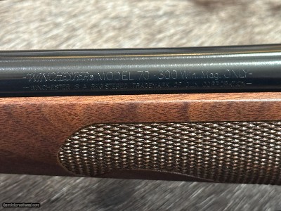 FREE SAFARI, NEW WINCHESTER MODEL 70 FEATHERWEIGHT 300 WIN MAG RIFLE 24