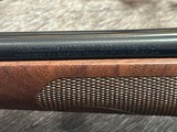 FREE SAFARI, NEW WINCHESTER MODEL 70 FEATHERWEIGHT 300 WIN MAG RIFLE 22