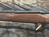 FREE SAFARI, NEW WINCHESTER MODEL 70 FEATHERWEIGHT 300 WIN MAG RIFLE 22