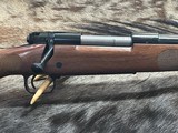 FREE SAFARI, NEW WINCHESTER MODEL 70 FEATHERWEIGHT 300 WIN MAG RIFLE 22