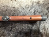 FREE SAFARI, NEW WINCHESTER MODEL 70 FEATHERWEIGHT 300 WIN MAG RIFLE 22
