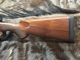 FREE SAFARI, NEW WINCHESTER MODEL 70 FEATHERWEIGHT 300 WIN MAG RIFLE 22