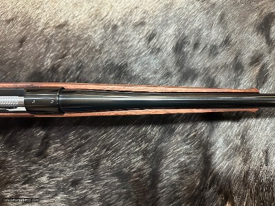 FREE SAFARI, NEW WINCHESTER MODEL 70 FEATHERWEIGHT 300 WIN MAG RIFLE 24