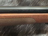 FREE SAFARI, NEW WINCHESTER MODEL 70 FEATHERWEIGHT 300 WIN MAG RIFLE 22