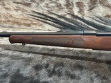 FREE SAFARI, NEW WINCHESTER MODEL 70 FEATHERWEIGHT 300 WIN MAG RIFLE 22