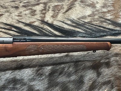 FREE SAFARI, NEW WINCHESTER MODEL 70 FEATHERWEIGHT 300 WIN MAG RIFLE 24