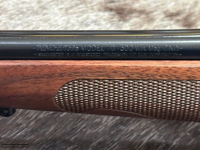 FREE SAFARI, NEW WINCHESTER MODEL 70 FEATHERWEIGHT 300 WIN MAG RIFLE 24