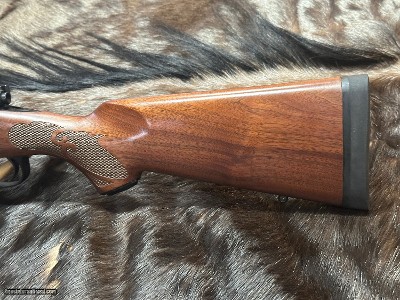 FREE SAFARI, NEW WINCHESTER MODEL 70 FEATHERWEIGHT 300 WIN MAG RIFLE 24