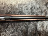 FREE SAFARI, NEW WINCHESTER MODEL 70 FEATHERWEIGHT 300 WIN MAG RIFLE 22