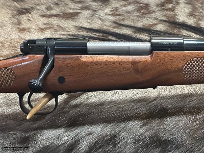 FREE SAFARI, NEW WINCHESTER MODEL 70 FEATHERWEIGHT 300 WIN MAG RIFLE 24