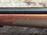 FREE SAFARI, NEW WINCHESTER MODEL 70 FEATHERWEIGHT 300 WIN MAG RIFLE 22