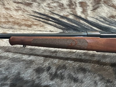 FREE SAFARI, NEW WINCHESTER MODEL 70 FEATHERWEIGHT 300 WIN MAG RIFLE 24