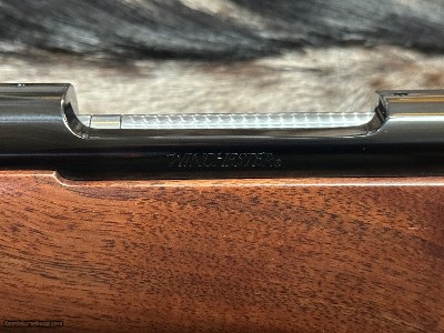 FREE SAFARI, NEW WINCHESTER MODEL 70 FEATHERWEIGHT 300 WIN MAG RIFLE 24