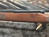 FREE SAFARI, NEW WINCHESTER MODEL 70 FEATHERWEIGHT 300 WIN MAG RIFLE 22