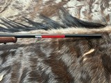FREE SAFARI, NEW WINCHESTER MODEL 70 FEATHERWEIGHT 300 WIN MAG RIFLE 22