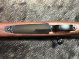 FREE SAFARI, NEW WINCHESTER MODEL 70 FEATHERWEIGHT 300 WIN MAG RIFLE 22