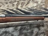 FREE SAFARI, NEW WINCHESTER MODEL 70 FEATHERWEIGHT 300 WIN MAG RIFLE 22