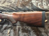 FREE SAFARI, NEW WINCHESTER MODEL 70 FEATHERWEIGHT 300 WIN MAG RIFLE 22