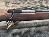 FREE SAFARI, NEW WINCHESTER MODEL 70 FEATHERWEIGHT 300 WIN MAG RIFLE 22