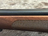 FREE SAFARI, NEW WINCHESTER MODEL 70 FEATHERWEIGHT 300 WIN MAG RIFLE 22
