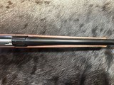 FREE SAFARI, NEW WINCHESTER MODEL 70 FEATHERWEIGHT 300 WIN MAG RIFLE 22