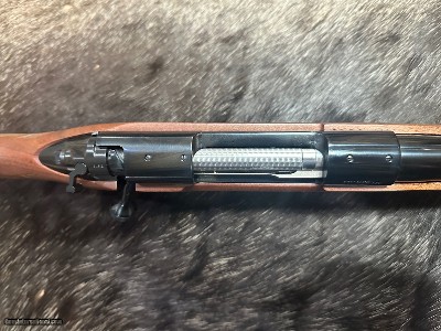 FREE SAFARI, NEW WINCHESTER MODEL 70 FEATHERWEIGHT 300 WIN MAG RIFLE 24